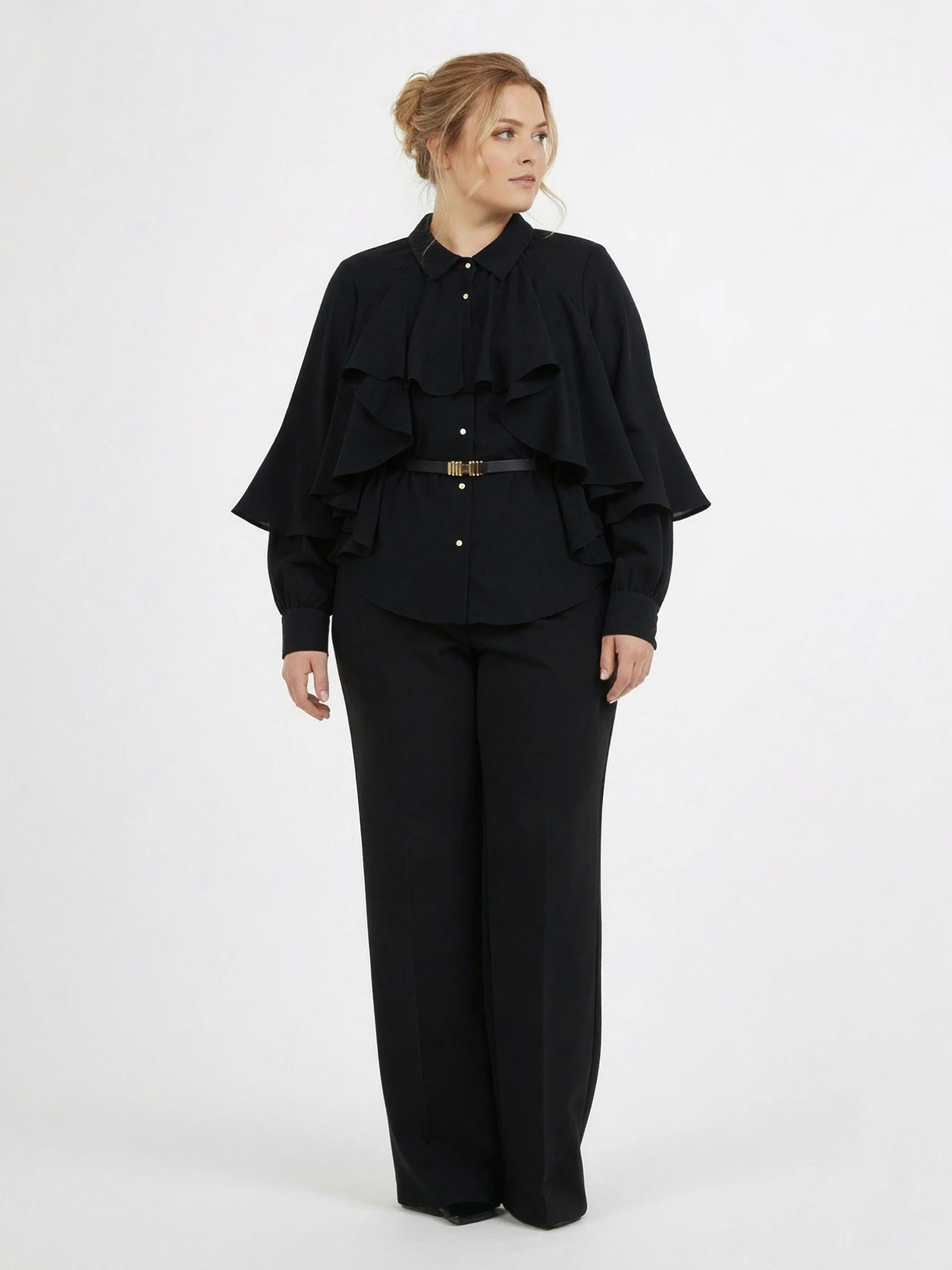 Блуза черного цвета с рюшами